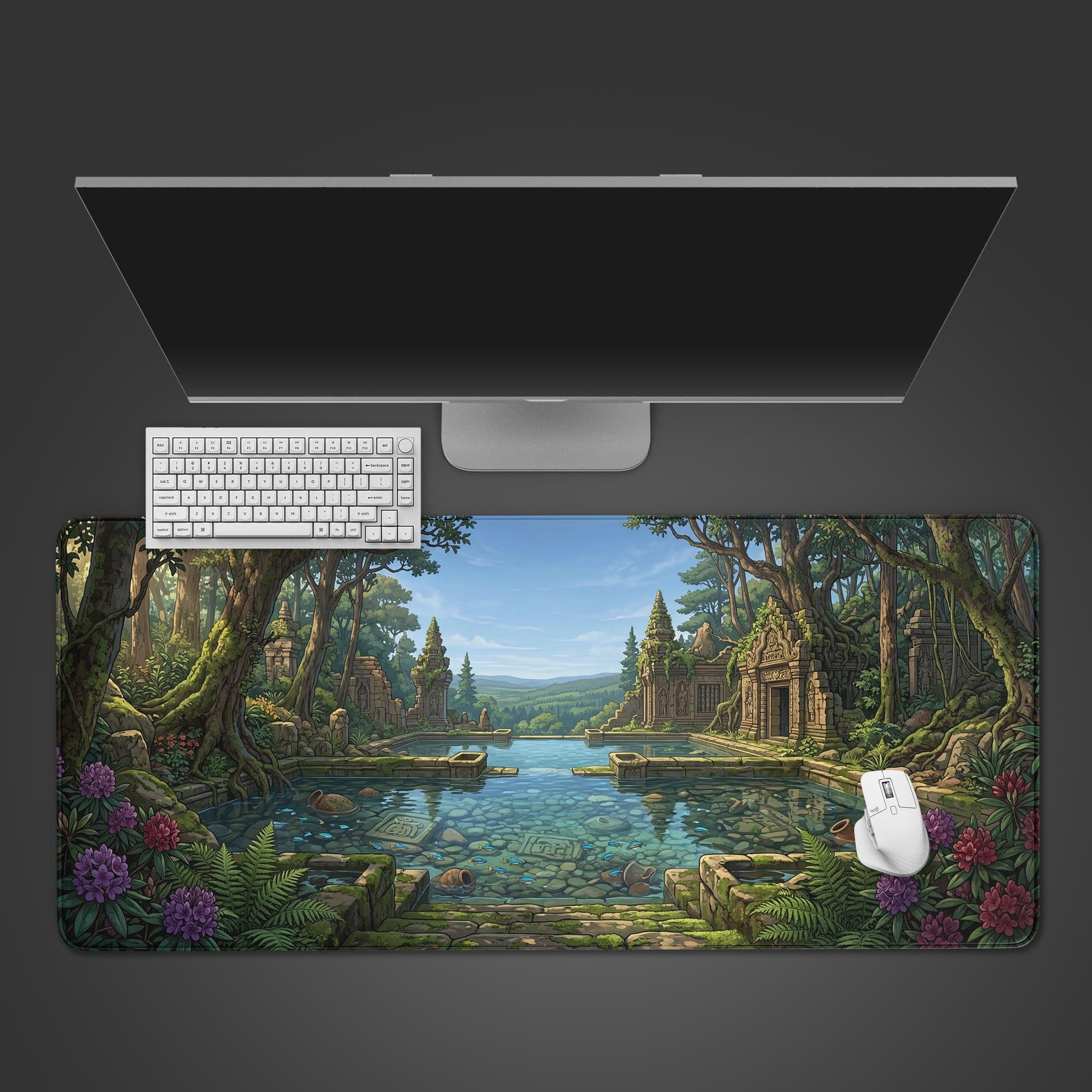 Top-down view of the Verdant Relic gaming desk mat, featuring a jungle temple ruin design, displayed with a sleek monitor, white keyboard, and mouse. - Epic Design Pads & Mousepads