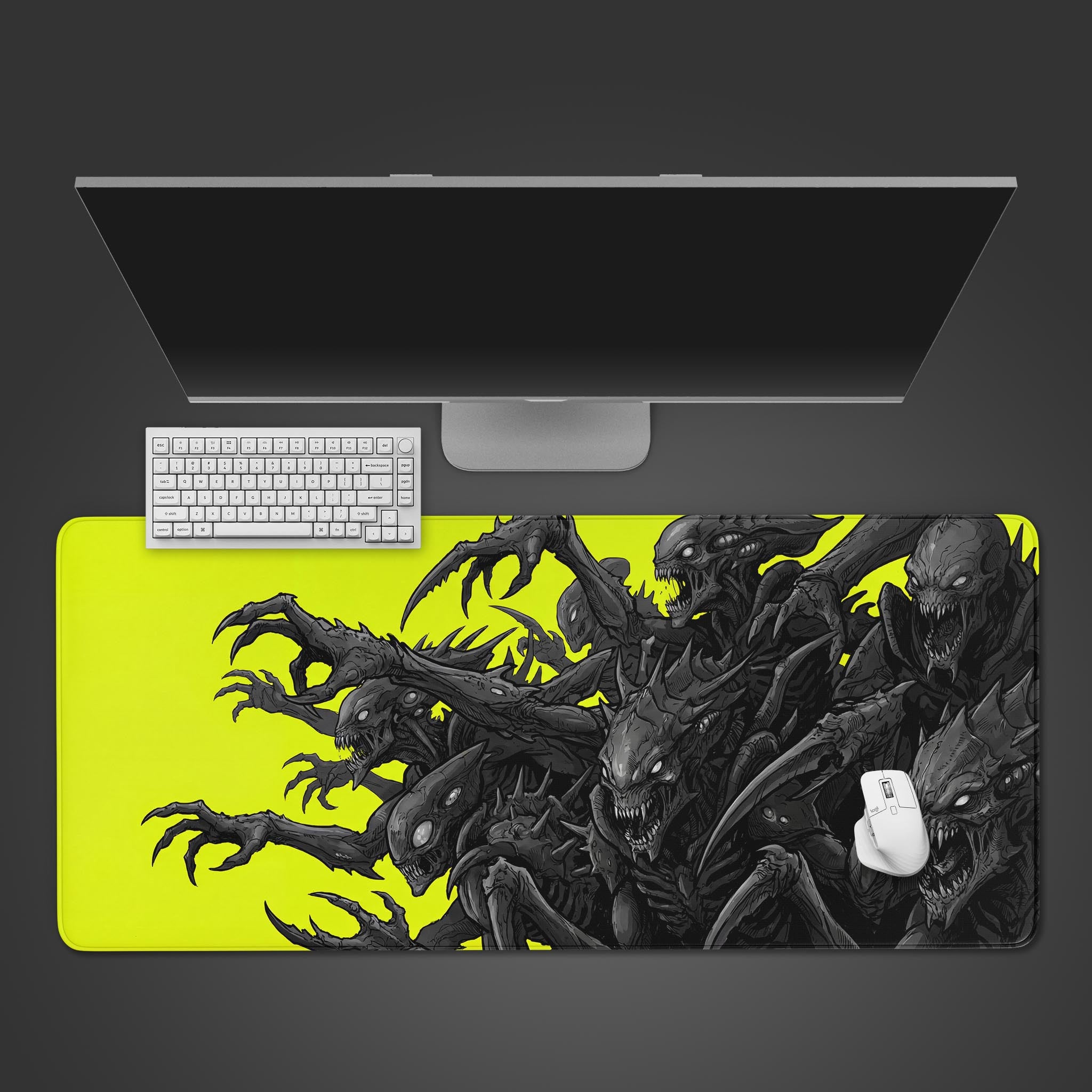 The Void Hunters Gaming Desk Mat shown from above, with its menacing alien swarm design in black on a bright yellow background. A keyboard and mouse are placed on it. - Epic Design Pads & Mousepads
