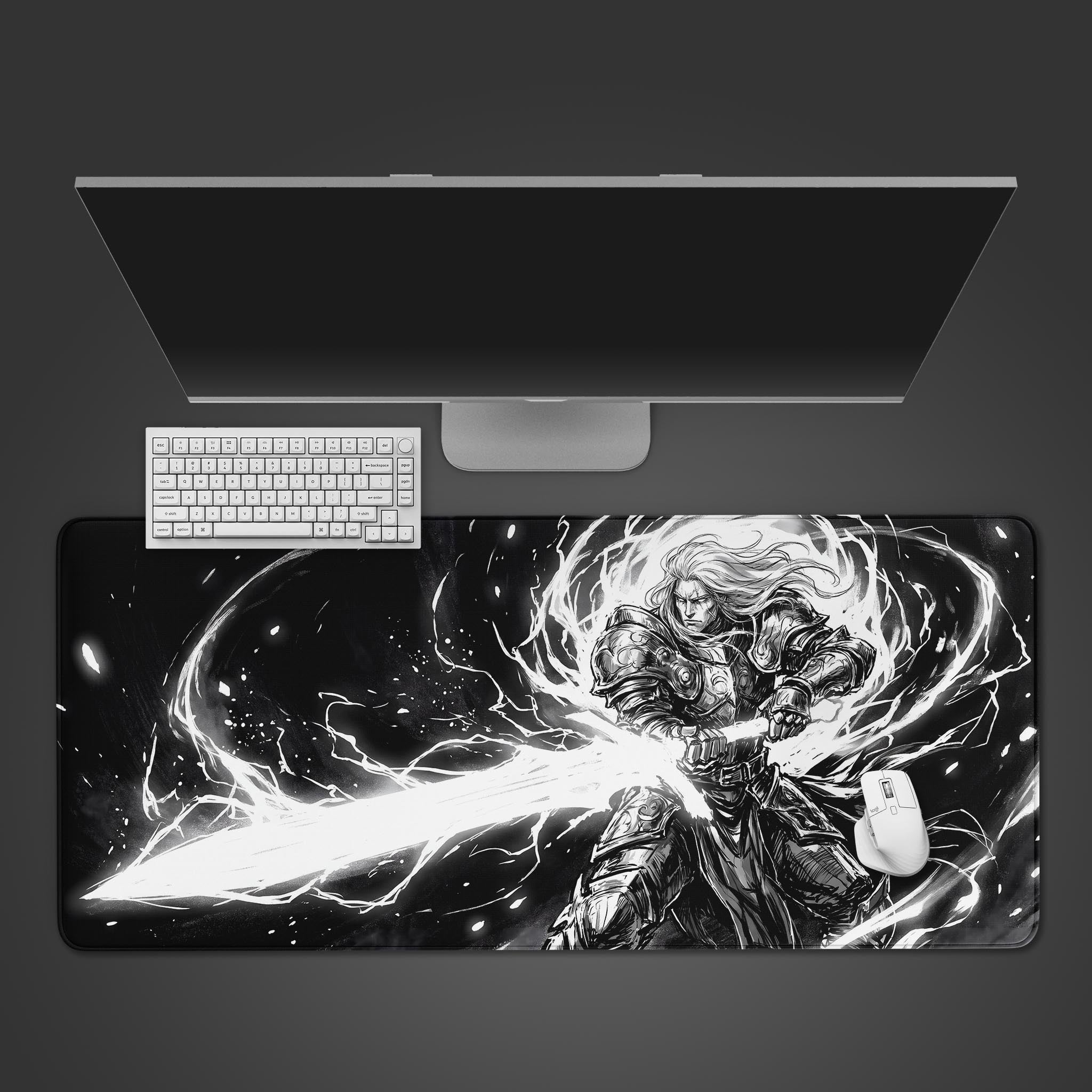 Monochrome anime warrior wielding a glowing sword on a large gaming desk mat