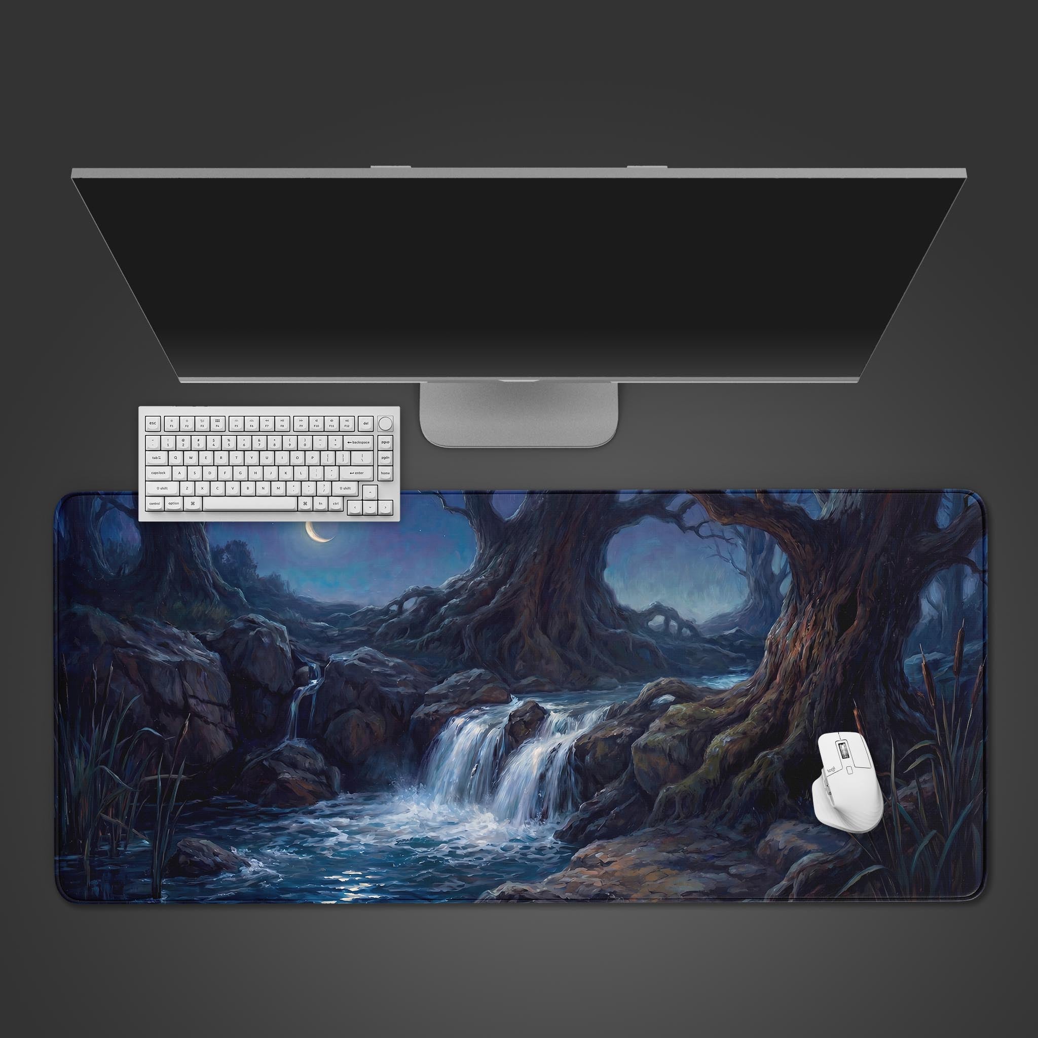 Moonlit Waterfall dark fantasy desk mat showing a glowing stream in a nocturnal forest