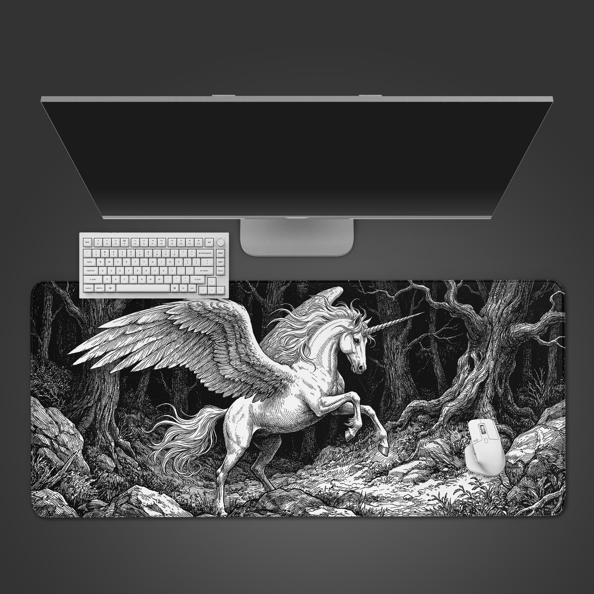 Black and white desk mat featuring a detailed engraving-style winged unicorn rearing in a dark fantasy forest.